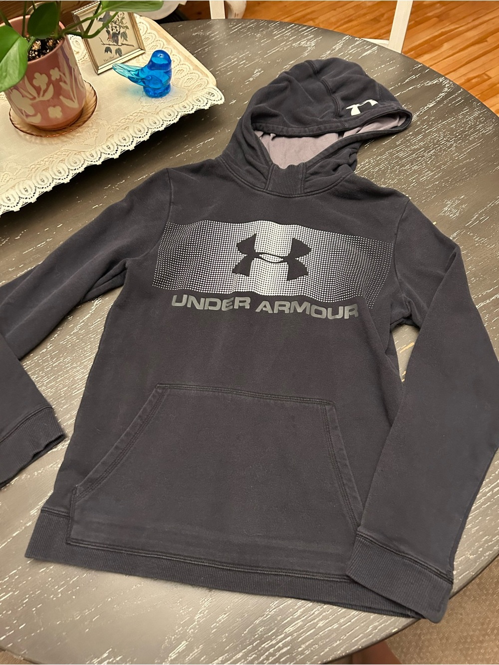 Worn in and comfy size Youth Large Under Armour hoodie.